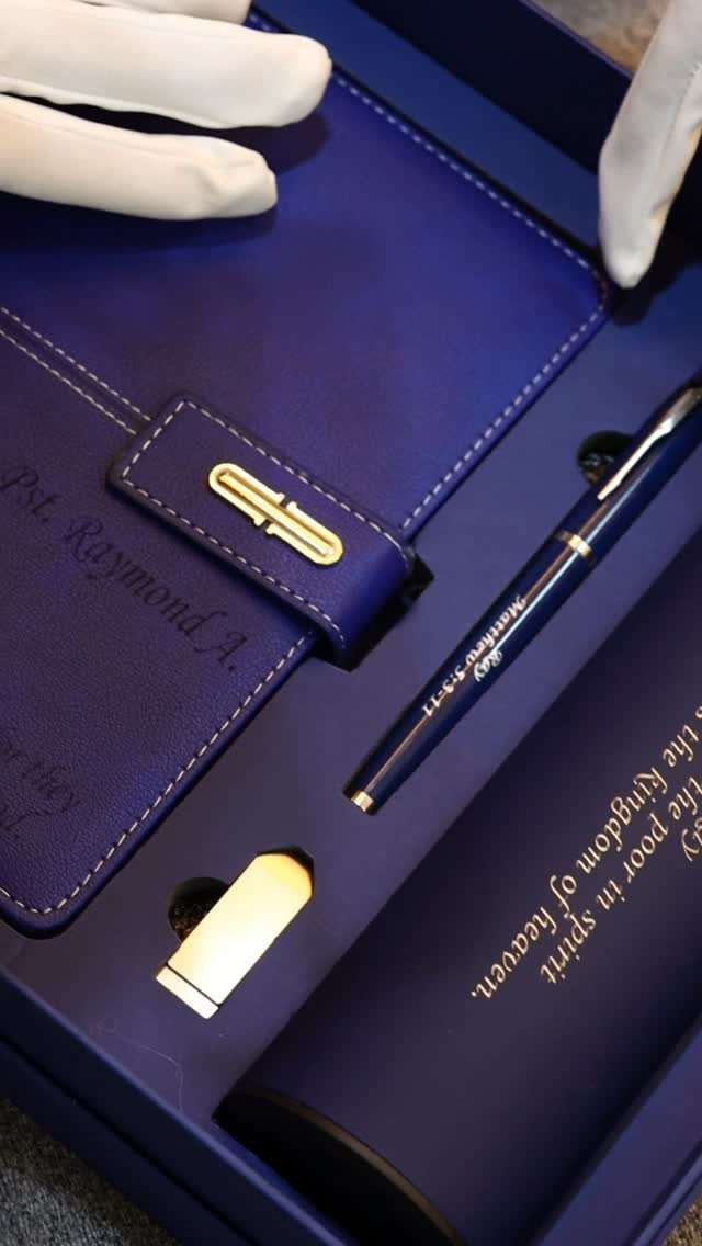 13 Ideas for a Birthday Gift for a Man Who Has Everything 9 Luxury blue gift set with personalized notebook, pen, and container in a box.