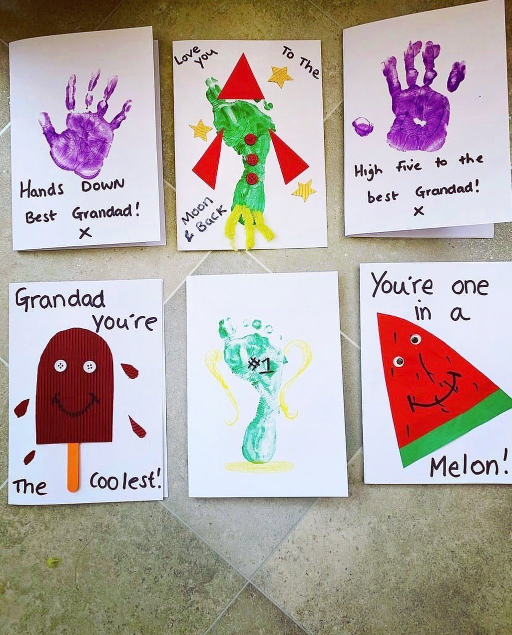 9 Cheap Fathers Day Gifts with Handmade and Easy Ideas 2 Six handmade cards for Grandad featuring colorful paint prints and cute drawings.