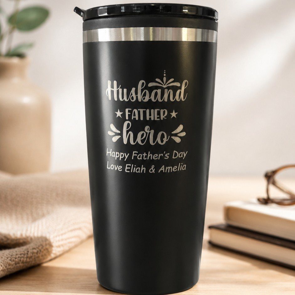 9 Cheap Fathers Day Gifts with Handmade and Easy Ideas 4 Black insulated travel thermos with personalized Father's Day text on a wooden table