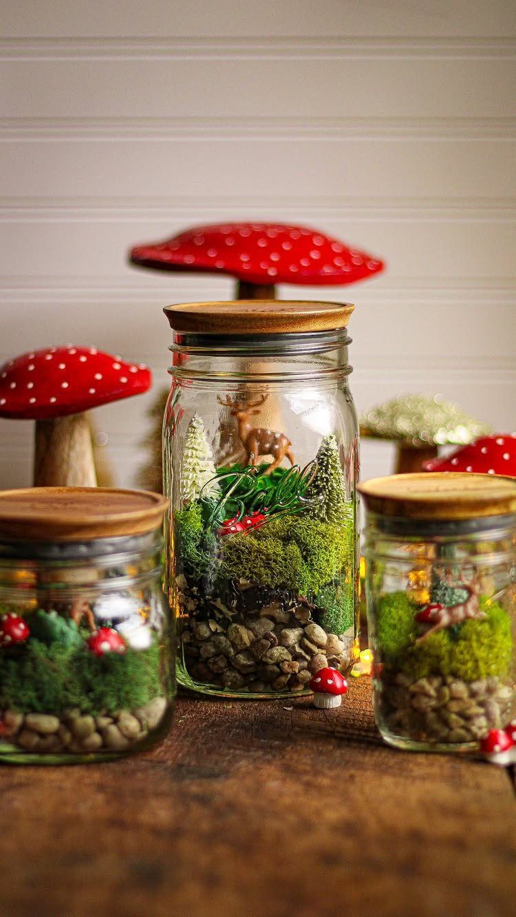 25 Christmas Gifts to Make at Home: Candles to Cookies 14 Miniature terrariums in glass jars with moss, pebbles, and tiny deer figurines.
