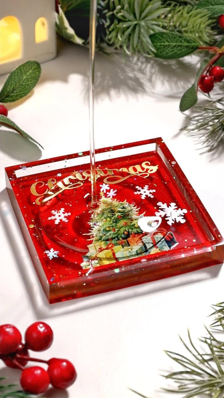 25 Christmas Gifts to Make at Home: Candles to Cookies 22 Red resin soap dish with Christmas tree design and water pouring into it