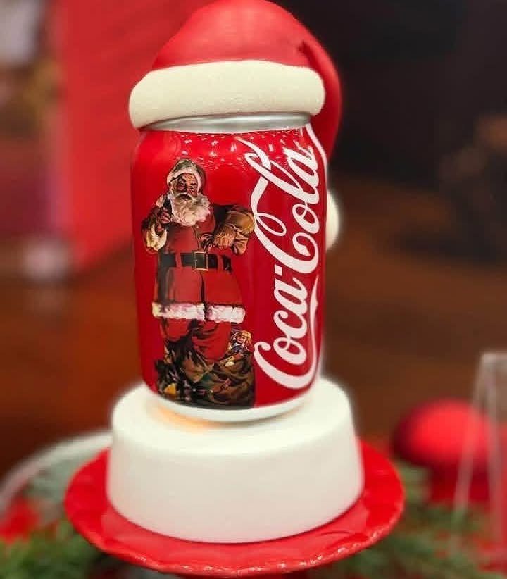 Coca-Cola Christmas Gift Ideas: 7 Picks for Fans 7 Coca-Cola can with Santa Claus wearing a Santa hat on a white base