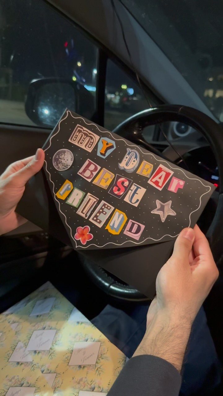 17 Creative Birthday Gifts for Friends and Family 10 Handmade black card with colorful lettering saying My Dear Best Friend held in car