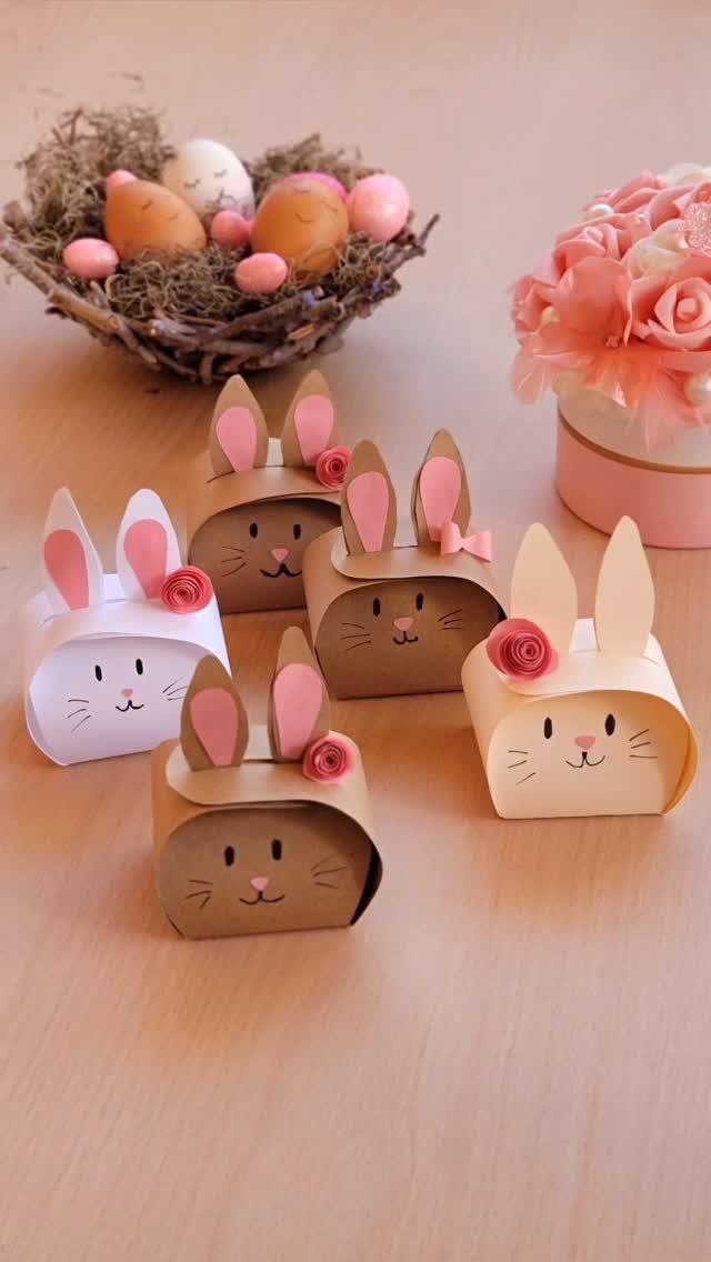 Easter Gift Box Ideas: 6 Options From Baskets to Bakery 5 Bunny shaped cardboard gift boxes with pink flowers and Easter eggs in background