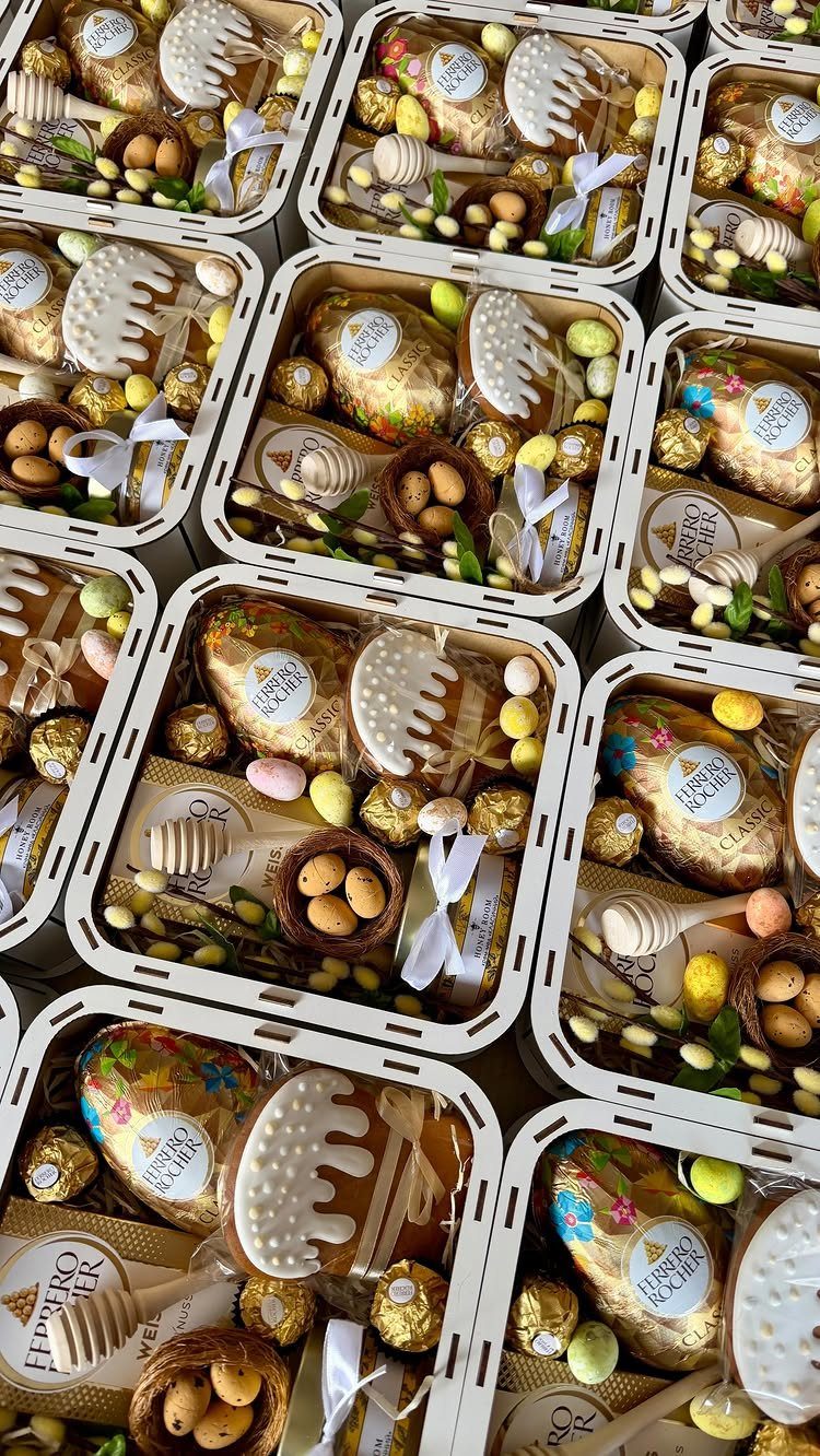 Easter Gift Box Ideas: 6 Options From Baskets to Bakery 6 White gift boxes filled with Easter cakes, chocolates, and honey dippers in a grid.