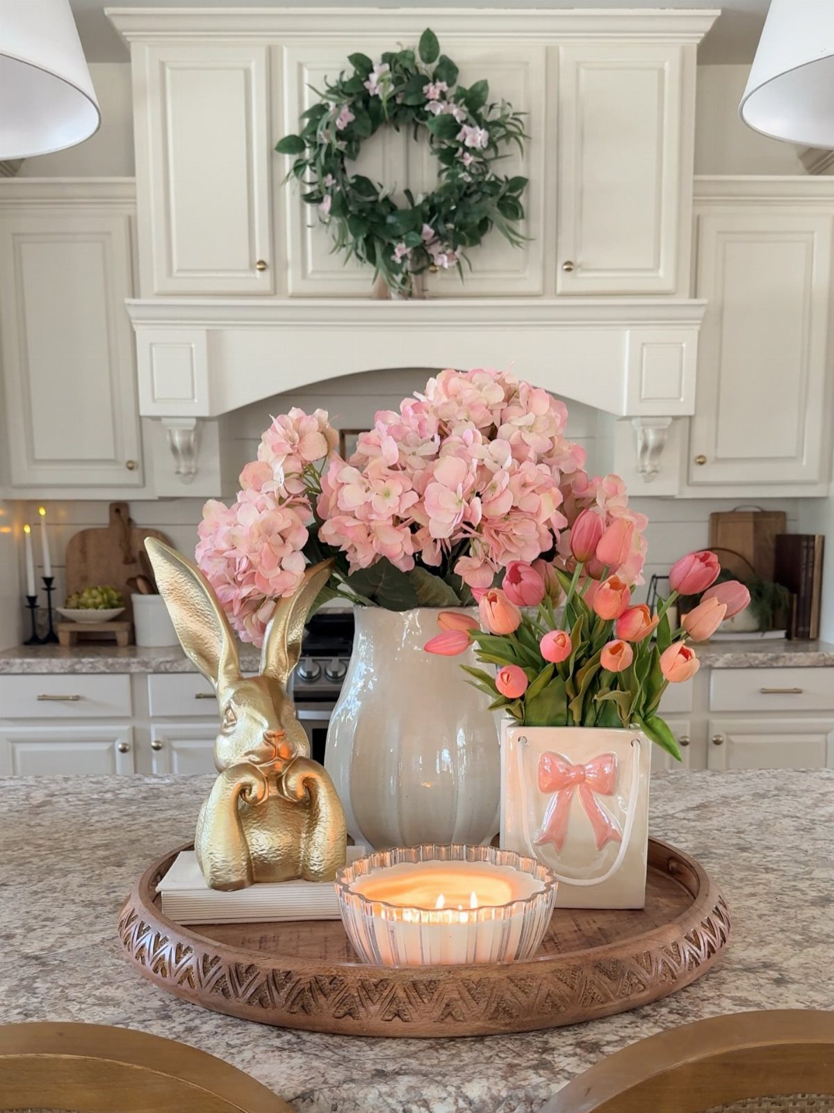 10 Easter Gifts for Young Adults They'll Actually Use 2 Pink hydrangeas and tulips in white vases with a gold bunny figurine.