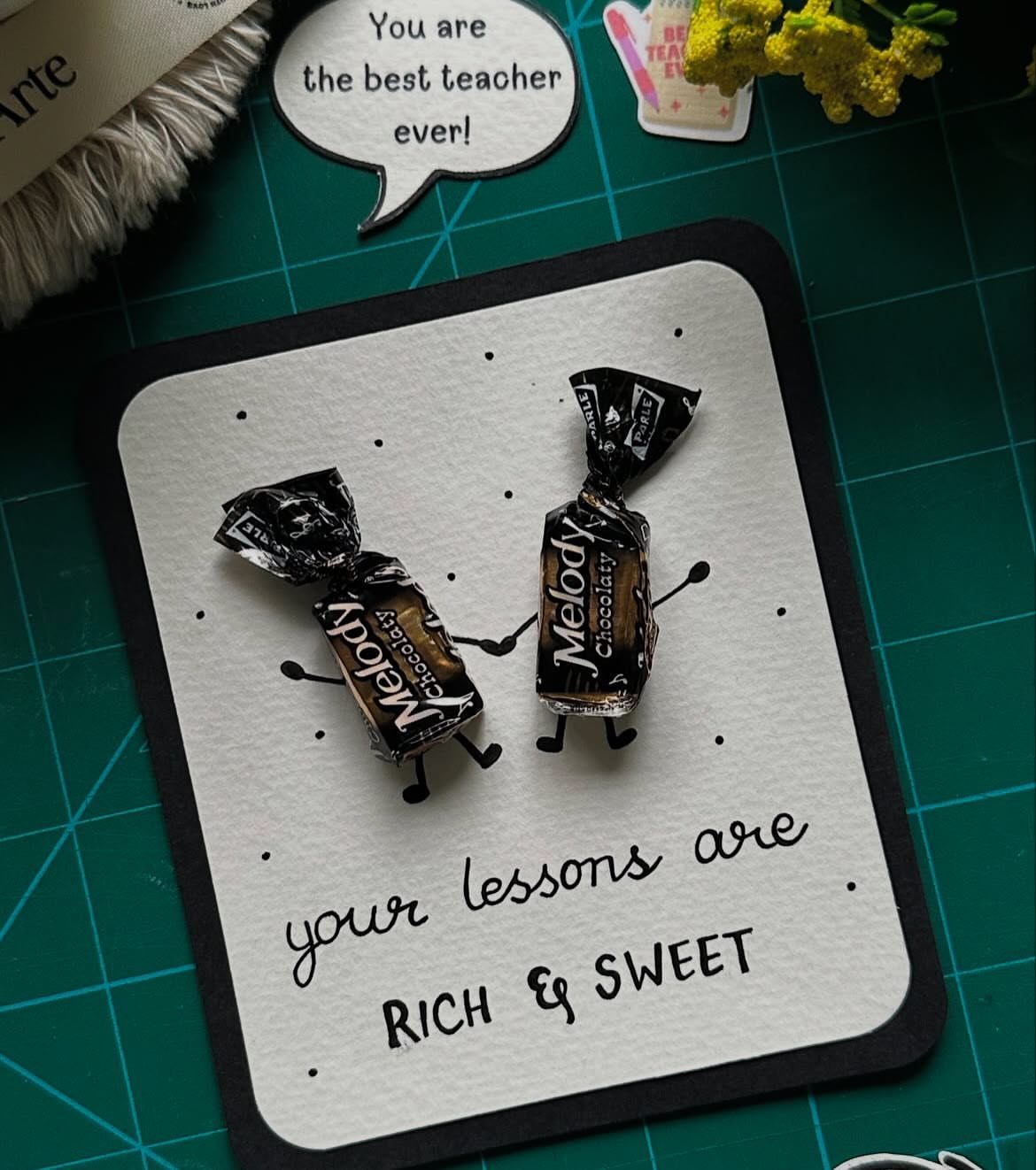 Two chocolates as characters on a card for a teacher gift