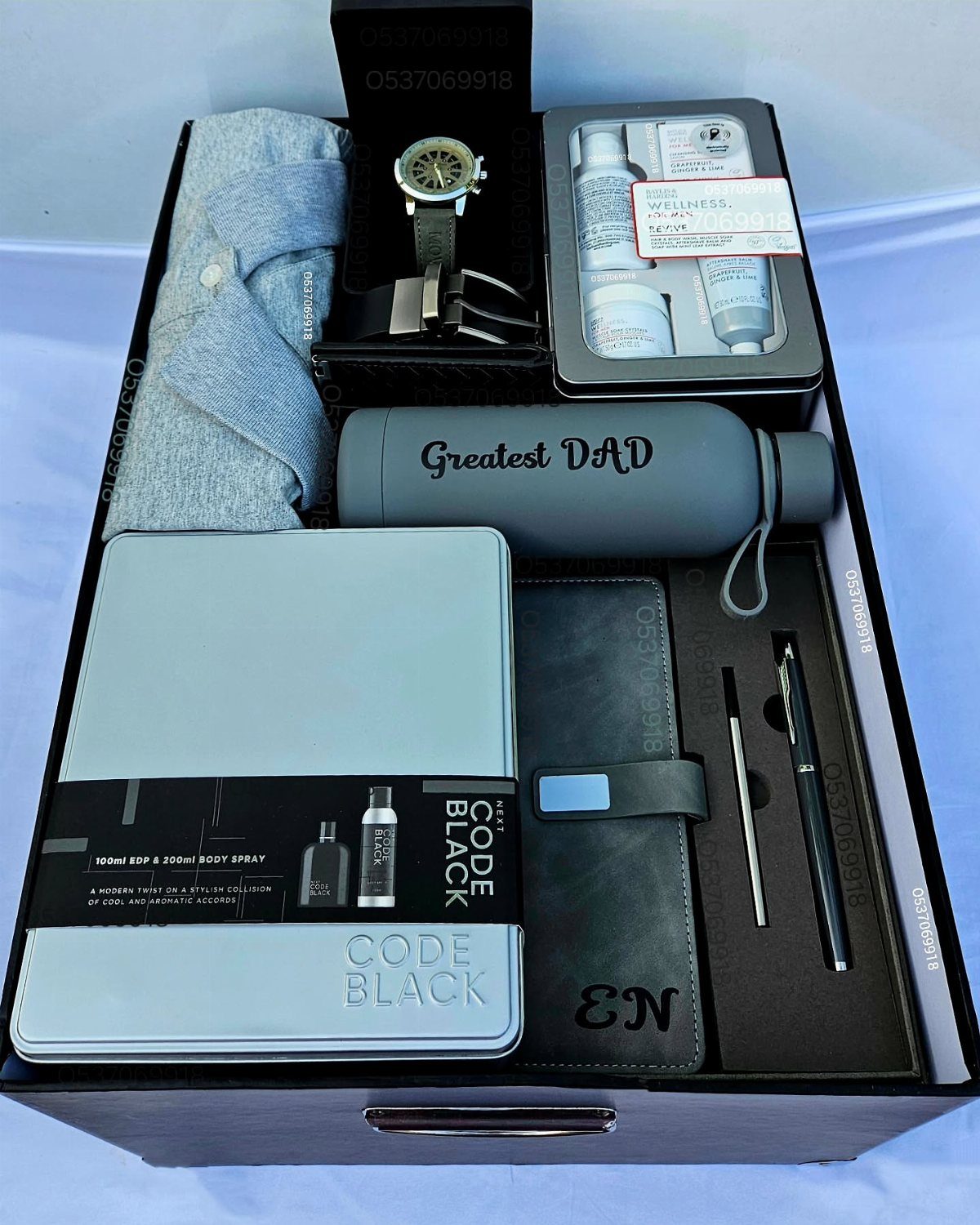 8 Father's Day Gift for Employees Ideas Dads Will Use 5 Gift box for Father's Day with shirt, watch, water bottle, and stationery.