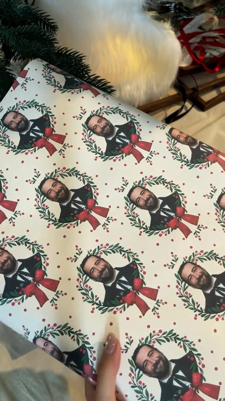9 Funny Christmas Gift Wrapping Ideas Your Family Will Love 6 White wrapping paper with a repeating pattern of a man's face in wreaths.