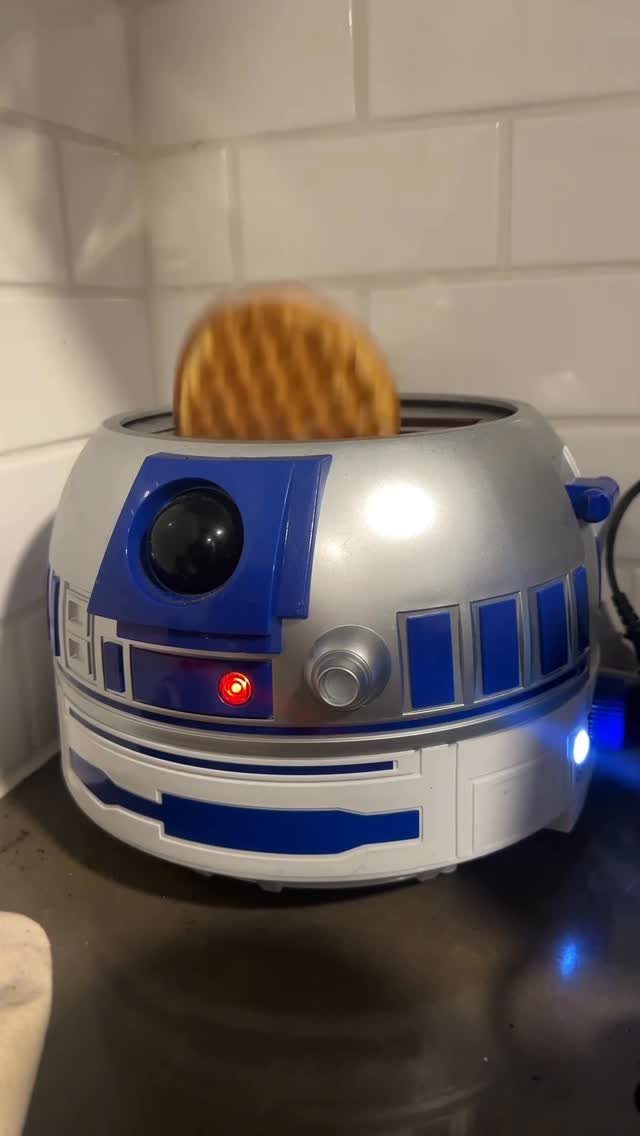 13 Funny Gag Gift Ideas for Birthdays and Office Parties 7 R2-D2 themed toaster popping up a golden-brown waffle in a white tiled kitchen