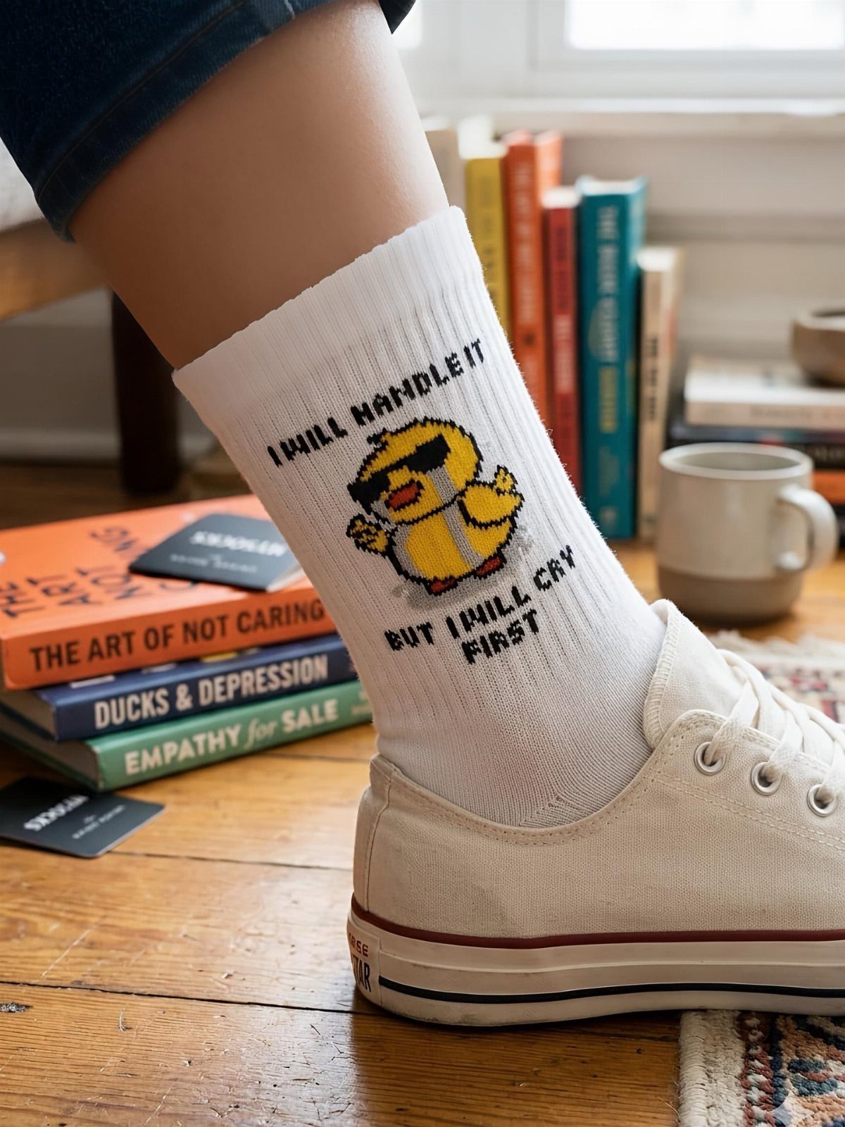 13 Funny Gag Gift Ideas for Birthdays and Office Parties 4 White crew sock with a pixelated yellow duck and funny text on ankle