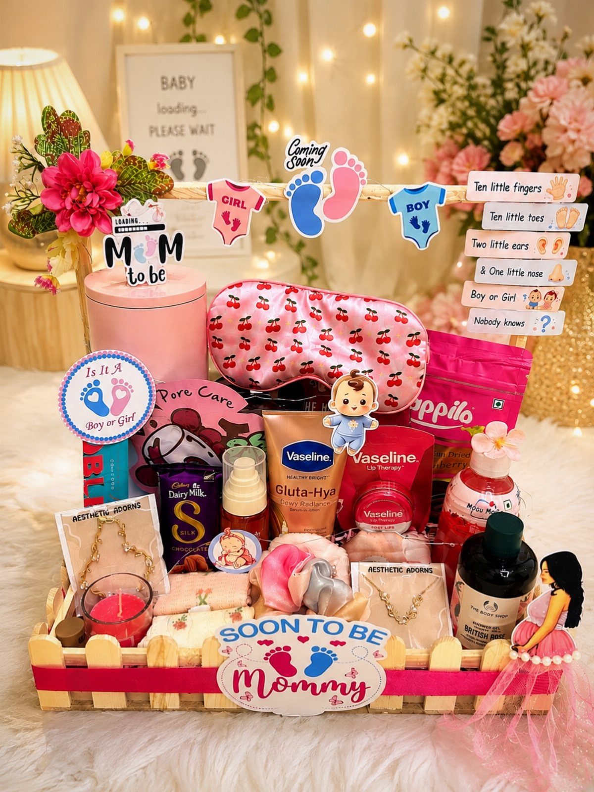 5 Gender Reveal Gifts for Parents-to-Be and Baby 2 Gift basket for expectant mother with skincare, sleep mask, and decorative signs.