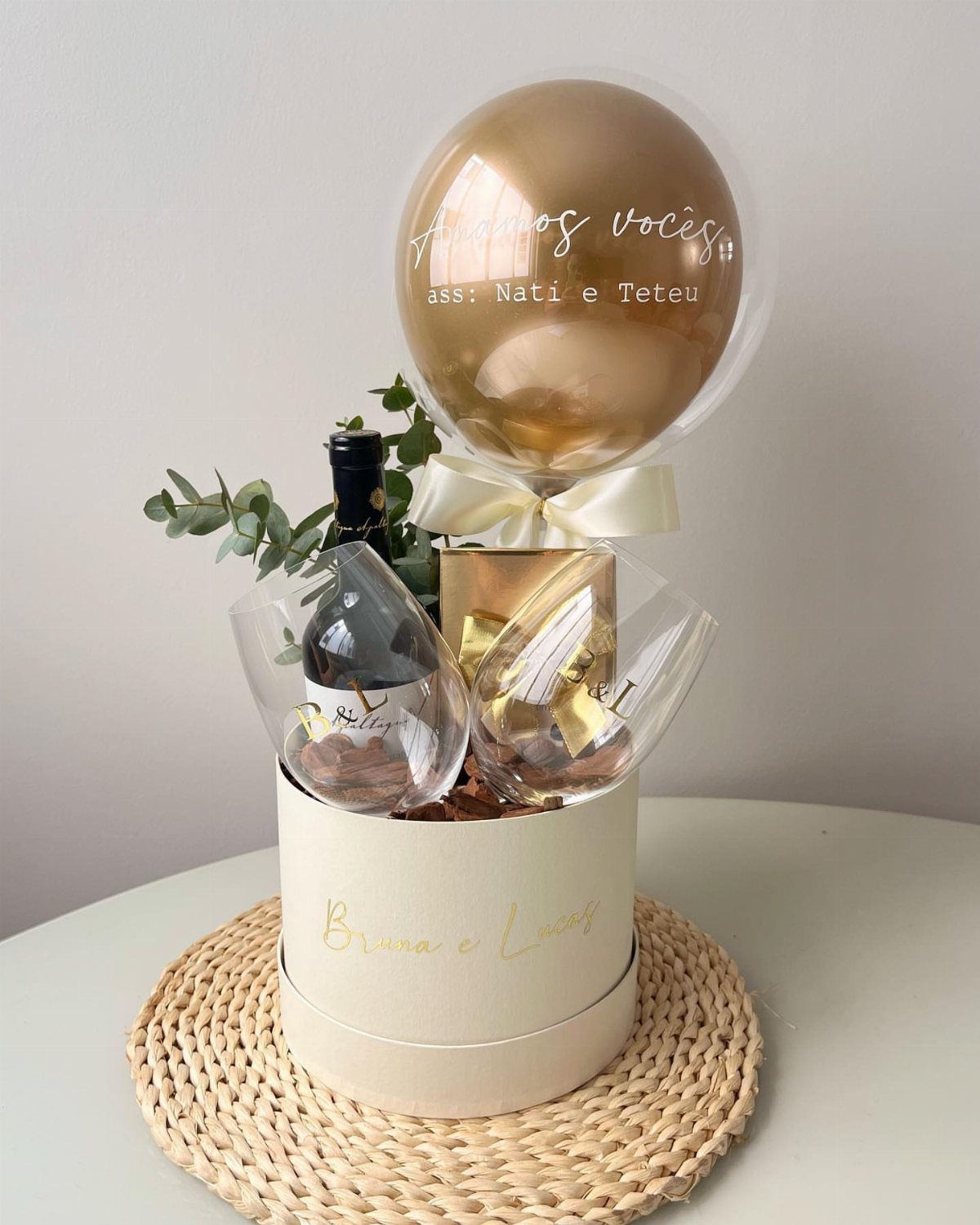 Gift Basket for Couple Ideas: 5 Picks to Give Together 1 Champagne gift basket with a gold balloon, sparkling wine, and two glasses.