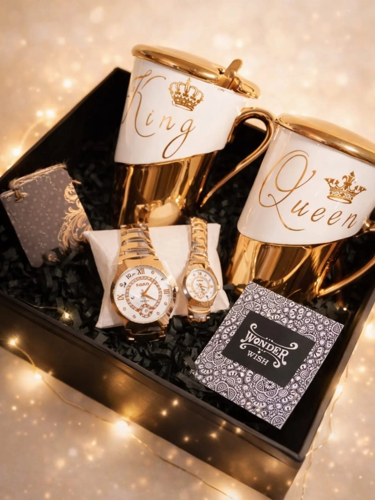 Gift Basket for Couple Ideas: 5 Picks to Give Together 3 Gift box with King and Queen mugs, gold watches, and a greeting card.