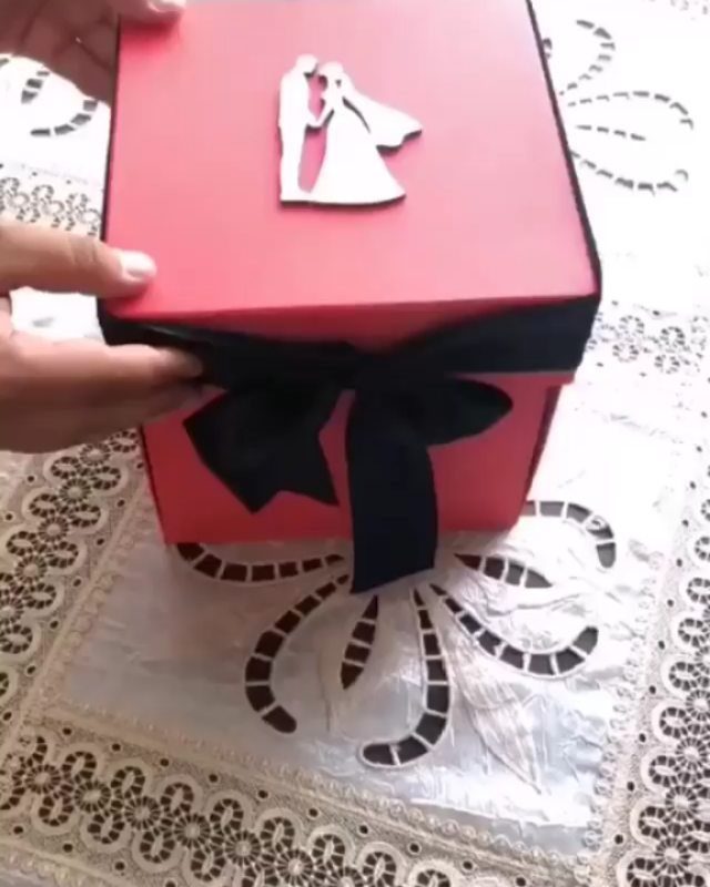 8 Gift Box Images: Red, Black, Pink, Blue and Clear 5 Red gift box with black ribbon and white wedding couple silhouette on top