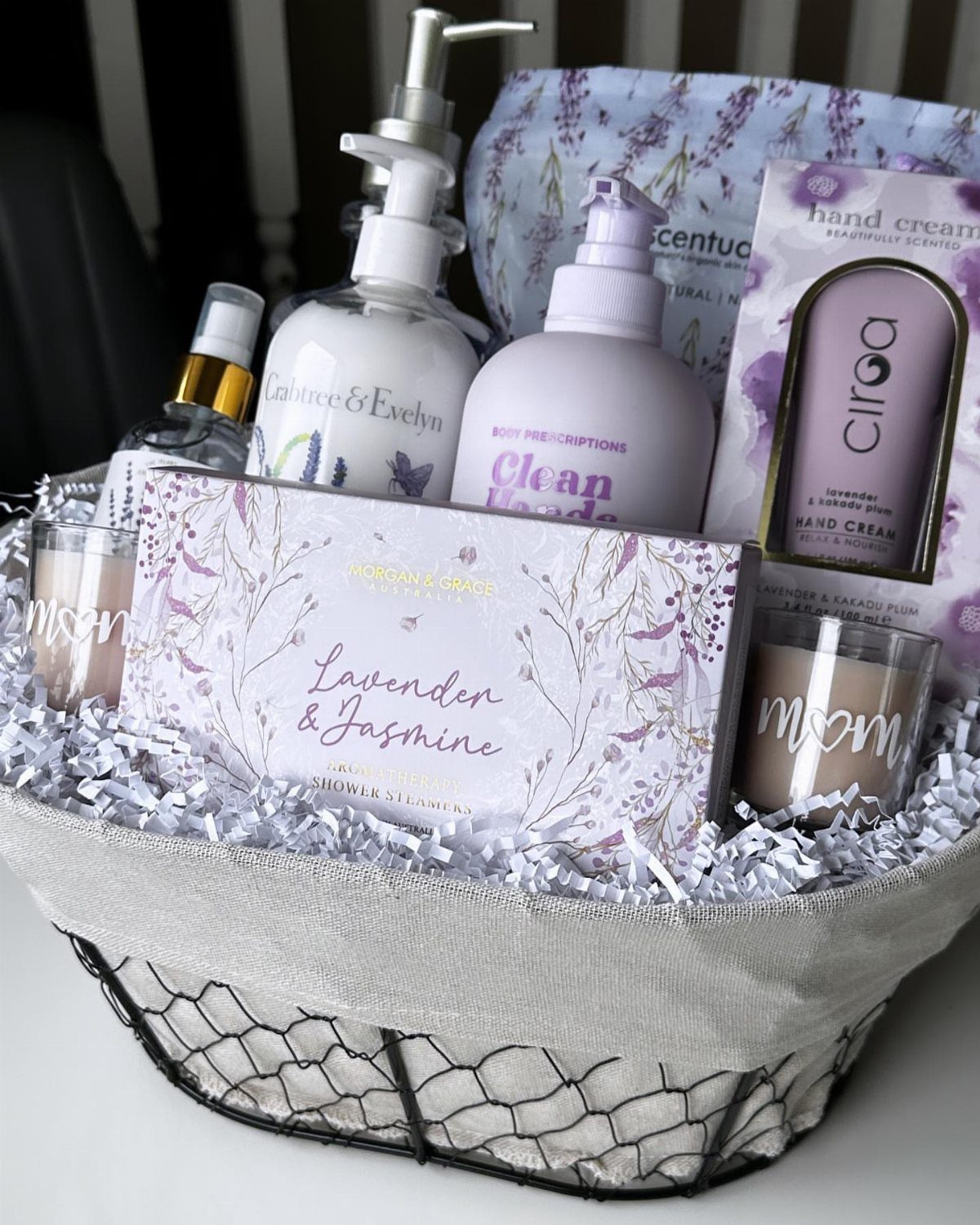 Lavender body care gift basket with lotions, soaps, and a mom candle.