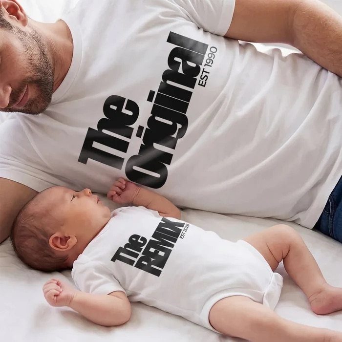 Man and baby wearing matching white shirts with Original and Remix text.