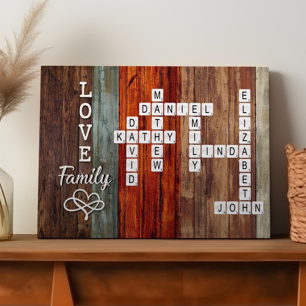 Wooden crossword wall art with family names on multicolored rustic planks.