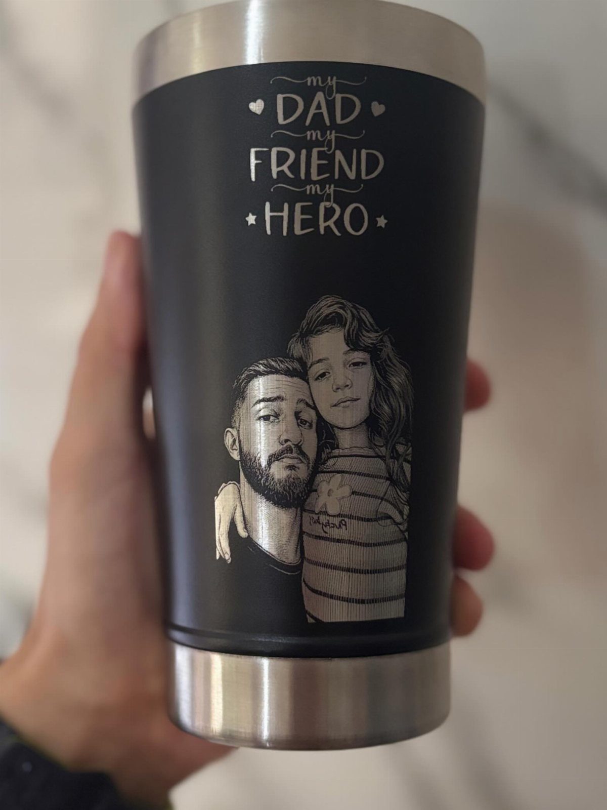 Matte black travel mug engraved with a father and daughter and heartfelt text.