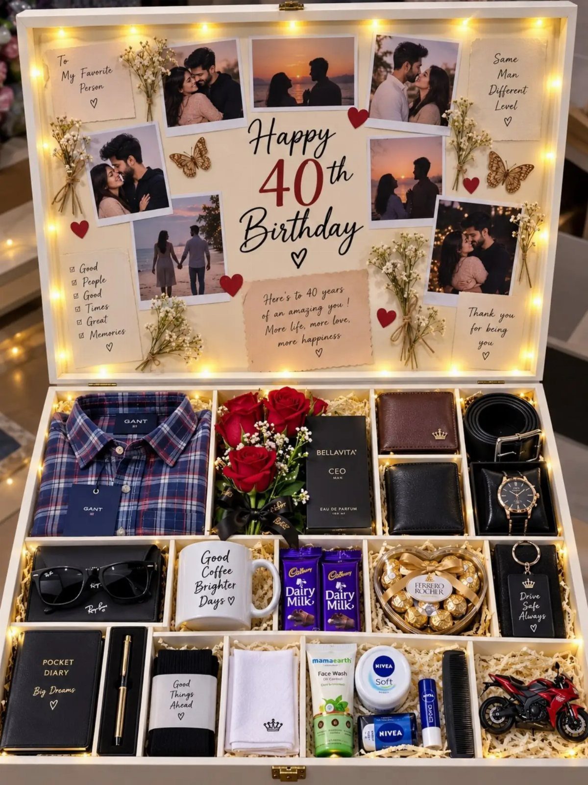 Open white birthday gift box filled with men's accessories, clothing, and romantic photos.