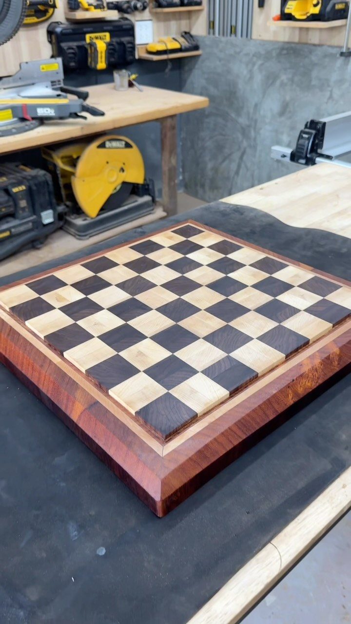 9 Homemade Father's Day Gifts Dad Will Actually Use 8 Handmade wooden checkerboard with dark and light squares on a workshop workbench