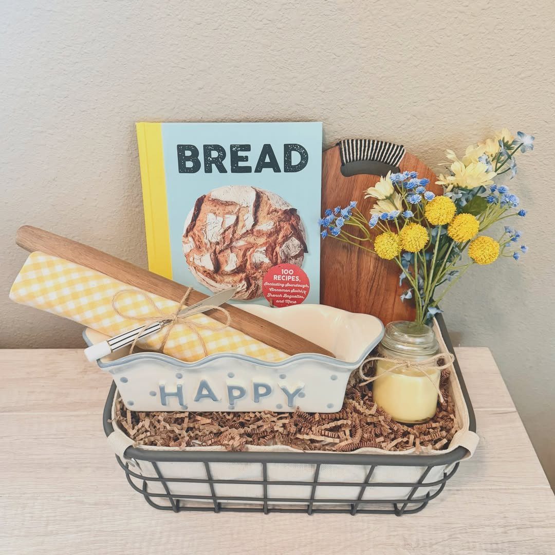 14 Household Gift Basket Ideas for Every Occasion 3 Baking gift basket with a bread cookbook, rolling pin, and wooden cutting board.