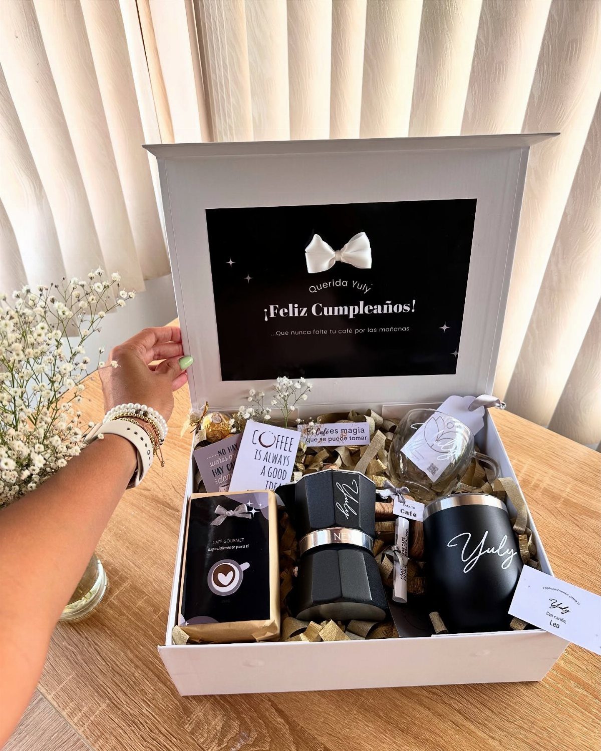 Nespresso Gift Basket Ideas: 5 Ways to Build One 3 Nespresso coffee maker and black tumbler in a white gift box with filler