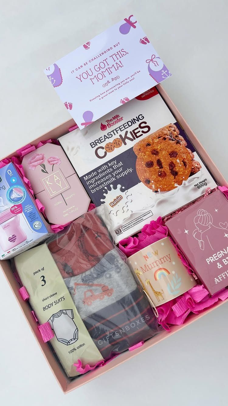 Postpartum Gift Basket Ideas for New Moms: 9 Picks 9 Postpartum gift basket with breastfeeding cookies, baby clothes, and a supportive card.