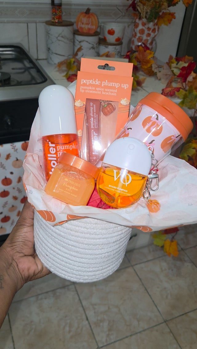Self Care Gift Box Ideas for Any Occasion: 5 Picks 3 White woven basket filled with pumpkin-themed beauty products and autumn skincare items.