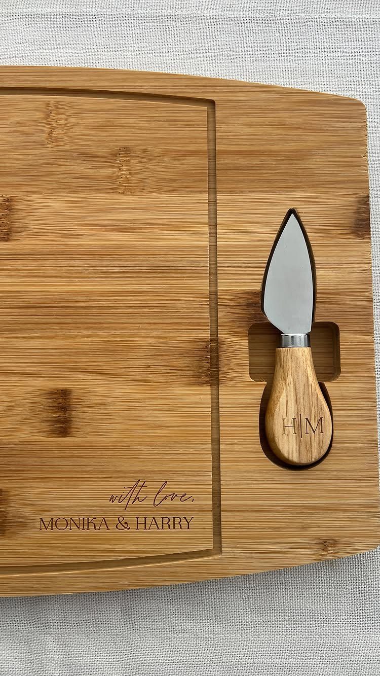 8 Small Gift for Mom Ideas, From Bath Soaks to Baskets 2 Bamboo charcuterie board and cheese knife engraved with personalized names and initials.