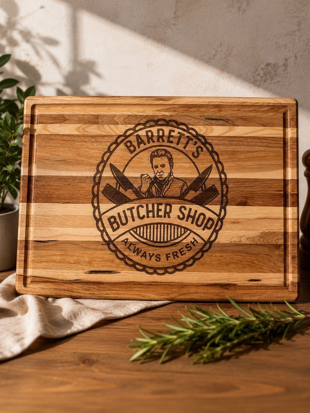 10 Special Gifts for Dad: Personalized Picks He'll Keep 5 Wooden cutting board with an engraved butcher shop logo on a rustic table