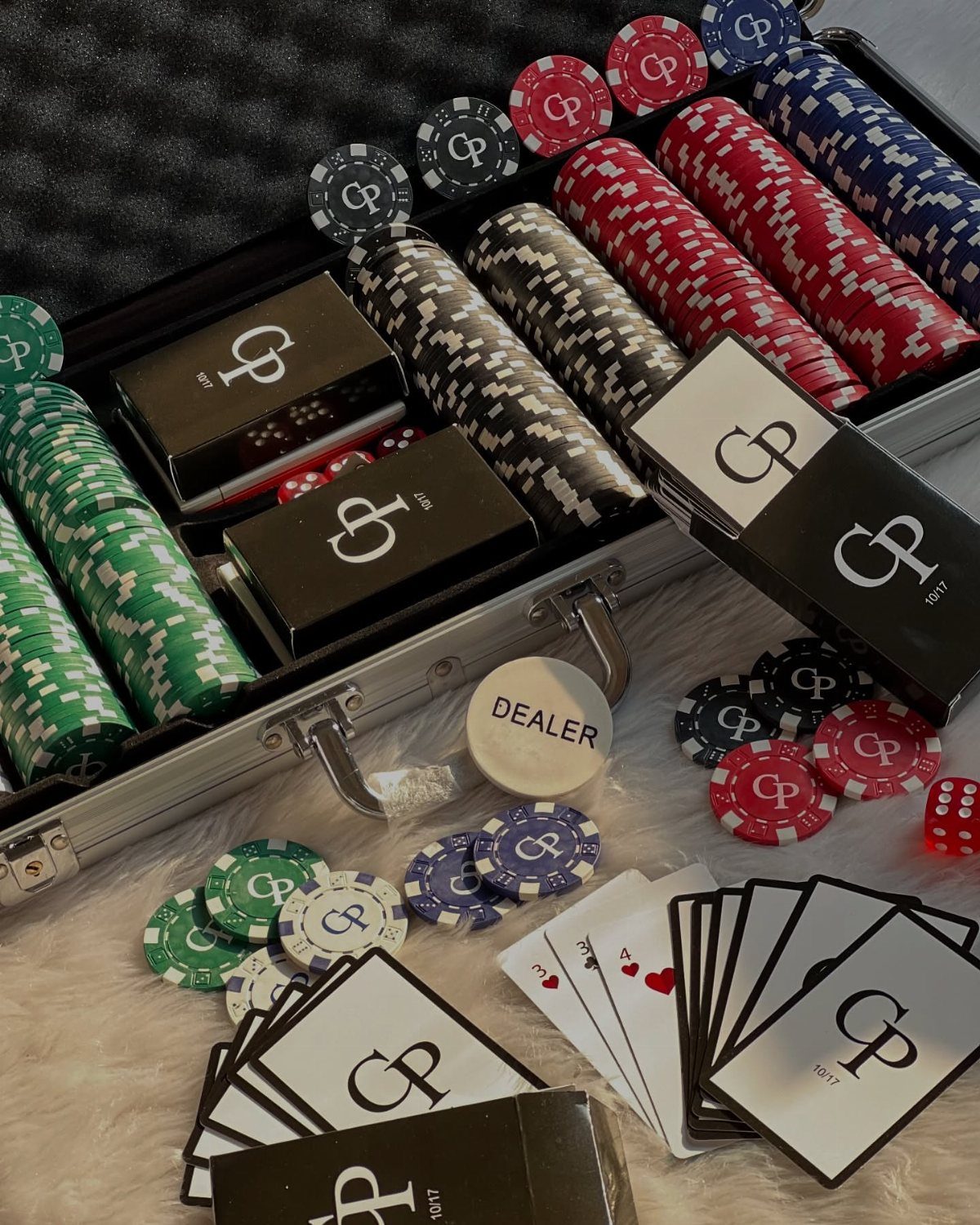 10 Special Gifts for Dad: Personalized Picks He'll Keep 3 Personalized poker set with monogrammed chips and cards in a silver carrying case.