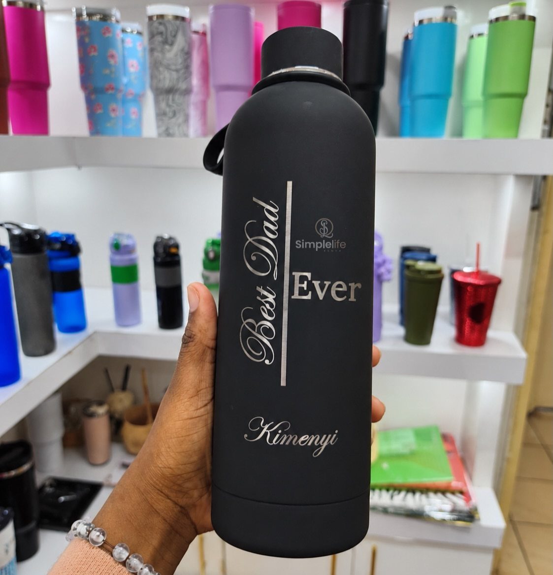 11 Step Father Gifts: From a Pocket Knife to a Photo Plaque 8 Matte black insulated water bottle engraved with Best Dad Ever and a name.