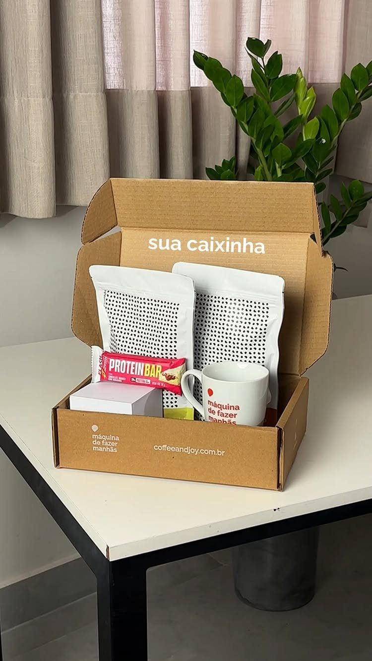 Tea Bag Gift Ideas to Make or Buy: 11 Sweet Picks 11 Cardboard gift box containing tea bags, a protein bar, and a white mug.