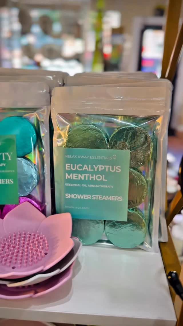 29 Trendy Gift Ideas for Her: The 2026 Gift Guide 10 Eucalyptus menthol shower steamers in clear packaging next to a pink body scrubber.