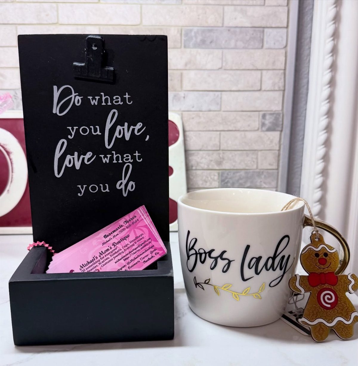 9 Unique Gift for Boss 5 Black wooden business card holder with motivational quote and a Boss Lady mug.