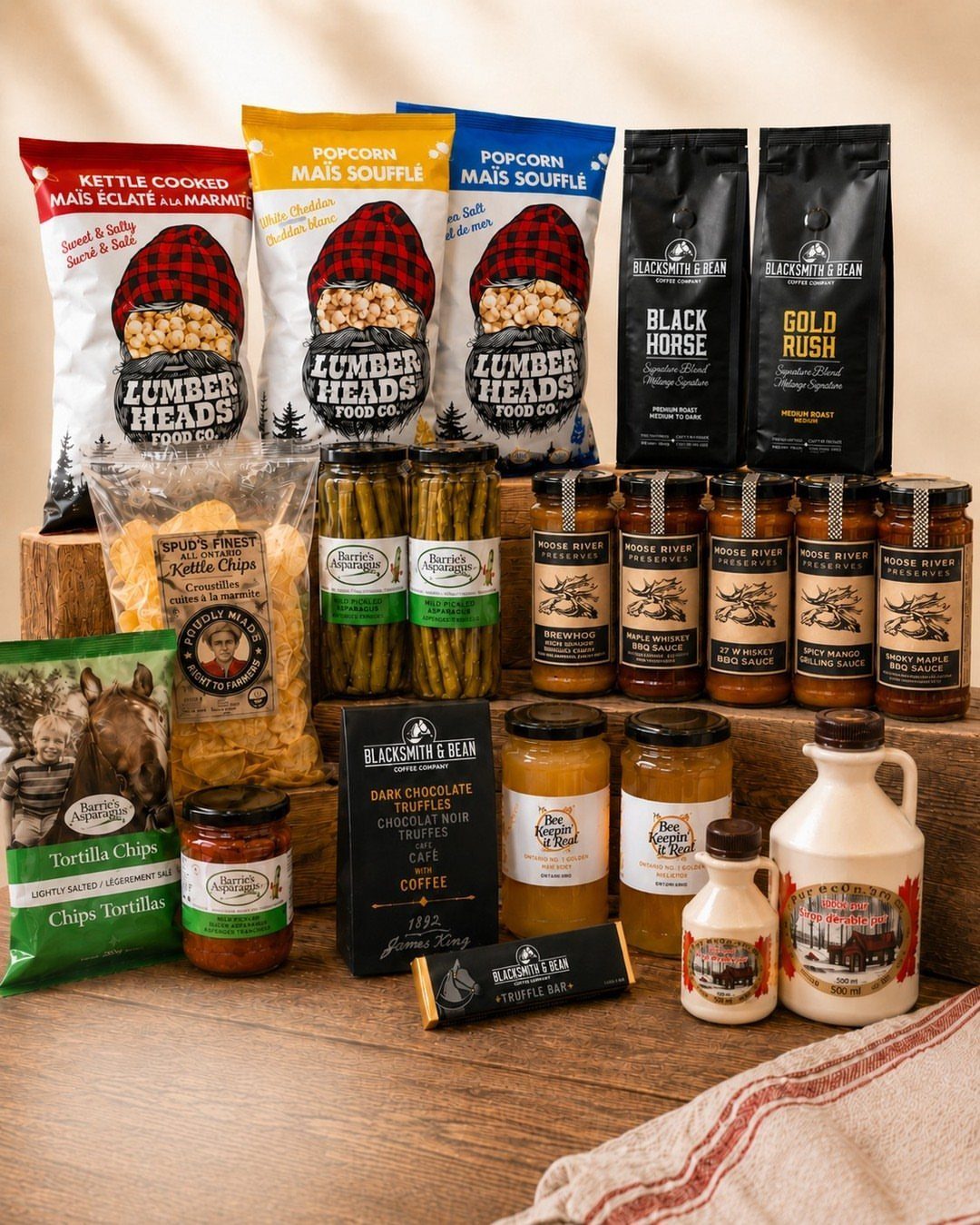 12 Useful Gifts for Dad: Practical Picks He'll Actually Use 5 Gourmet food gift basket with popcorn, coffee, honey, and preserves on wooden crates.